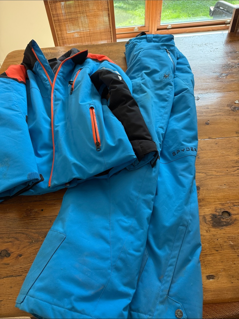 Spyder Bright Blue Kids' Ski Jacket and Pants with Orange Accents